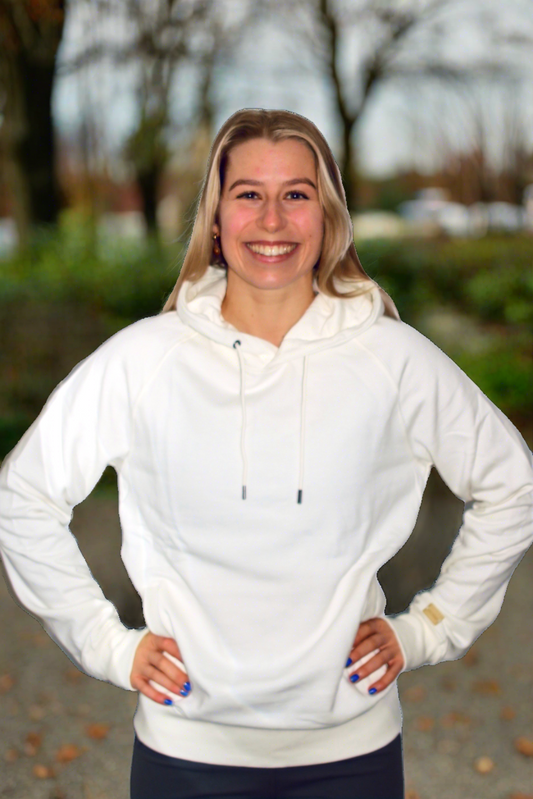A smiling CrossFit Girl wearing a Hoody in Woodlands